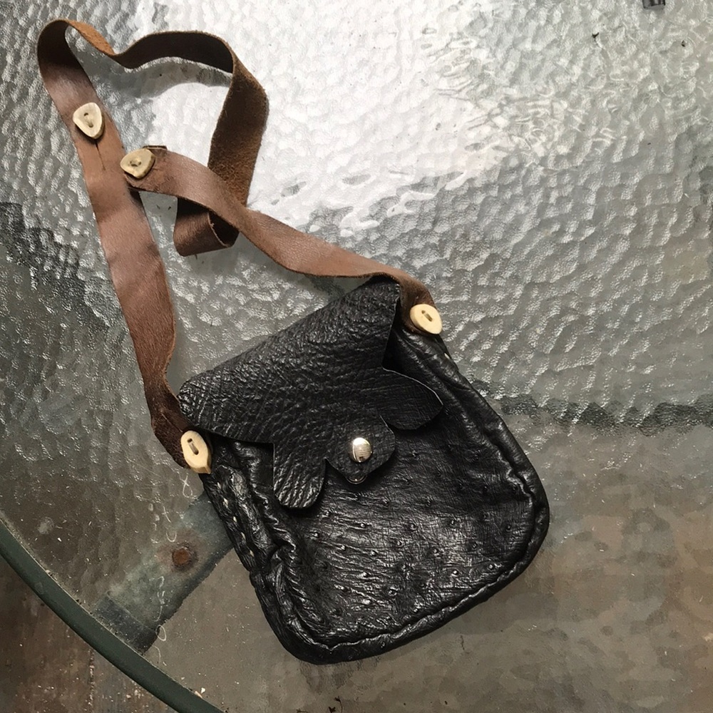 Handcrafted Ostrich Leather Boho pouch or purse with 4 antler button accents.